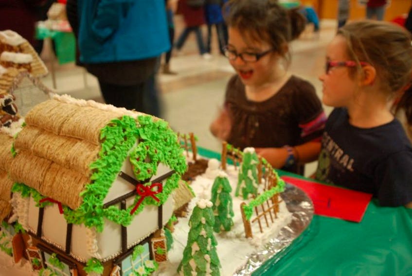 <p>After a three-hour competition, winners are announced in several categories at the annual Gingerbread House contest. This year’s competition will be held on Dec. 10 at the Yarmouth Mall.<br />CARLA ALLEN PHOTO</p>