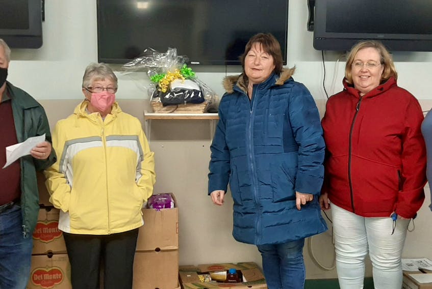 The 2020 harness racing season may now be over, but the Cape Breton Horseowners and Northsides Downs have delivered a gift that will keep on giving, at least for a while. After a three-week food drive, boxes of food and other items along with monetary donations were handed over to the North Sydney Food Bank. From left, food bank representatives John and Karen Oram, track volunteer Dian Collins, simulcast manager Debra Rankin and track manager Janice Thorne. CONTRIBUTED