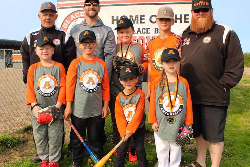 Members of the Glace Bay Antonians Minor Baseball Association are shown at Row Street Ball Field in Bridgeport earlier this week. The association wrapped up its 2020 campaign last weekend and had 100 players registered for the month-and-a-half season. From left, front row, Ben Peterson, Hudson Gouthro, Emmett Gouthro, and Miley Russell; back row, Nick Bonnar, Greg Gouthro, Jacob Ellsworth, Tristen Fowler and Tim Fowler. JEREMY FRASER • CAPE BRETON POST