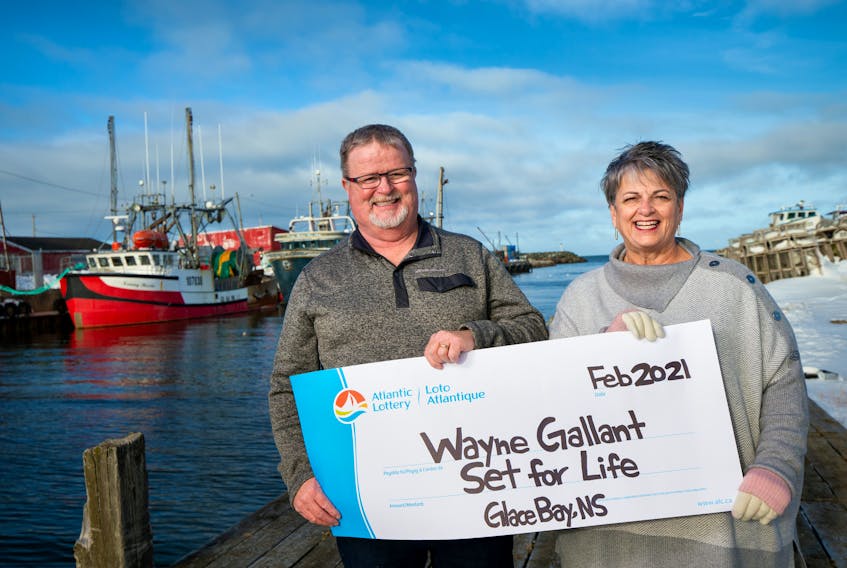 Wayne Gallant and his wife, Lois, are all smiles as they collect their winnings from an Atlantic Lottery Set for Life Scratchn'Win lottery ticket.  - CONTRIBUTED