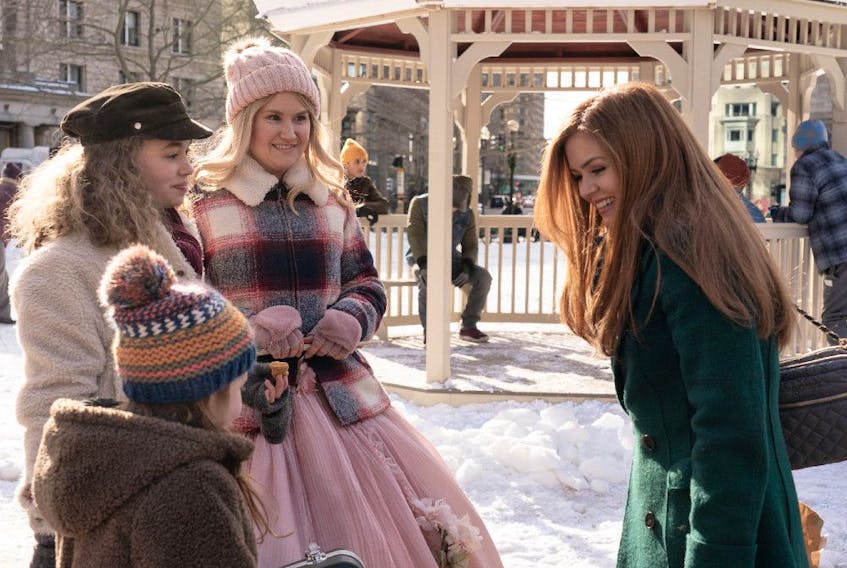 Jillian Bell plays fairy godmother to Isla Fisher (right) and her kids in Godmothered.