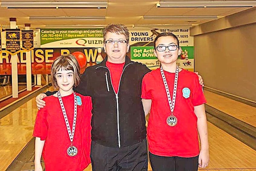 Chloe Buttery (left) and Bethany Walters (right), earned medals at the youth bowling provincial tournament in St. John’s last March. The girls are seen here with coach Carla Buttery. Bowling is gearing up for a new season, with registration Sept. 13 at the Bruce II.