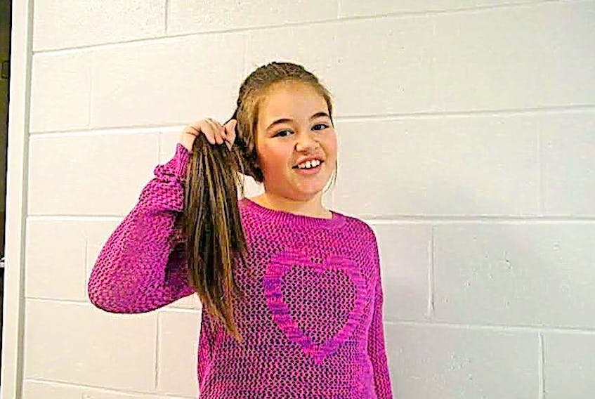 Burgeo is proud to recognize Chloe Mercer, a Grade 5 student of Burgeo Academy and the youngest daughter of Darrell and Kelly Mercer. Chloe cut off eight inches of her hair to donate to The Canadian Cancer Society: "Pantene Beautiful Lengths" in Mississauga Ontario.