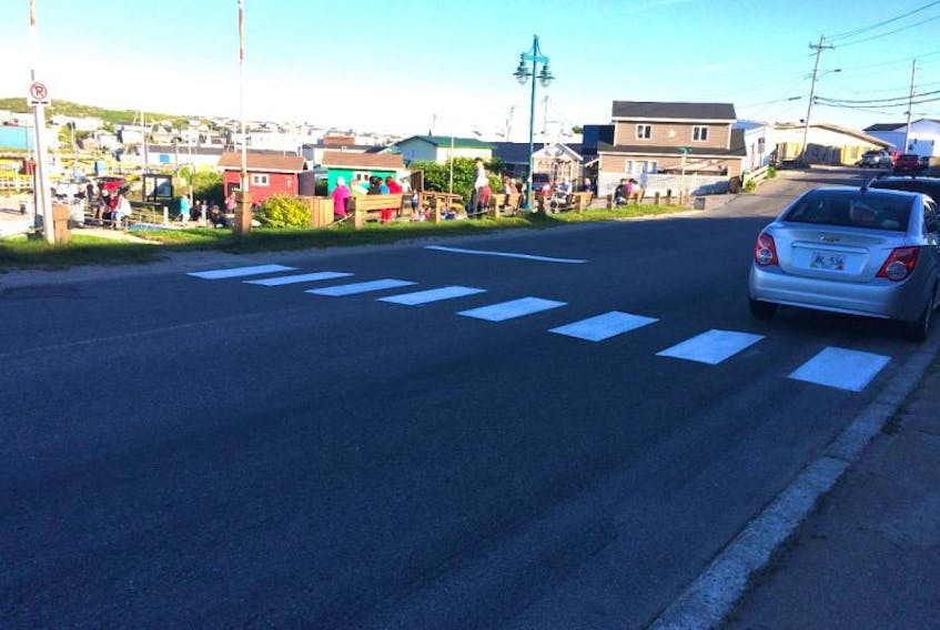 Town crews in Port aux Basques are starting to paint crosswalks around town. This one along Caribou Road by Scott's Cove Park was one of the first to get a fresh coat of paint this summer.
