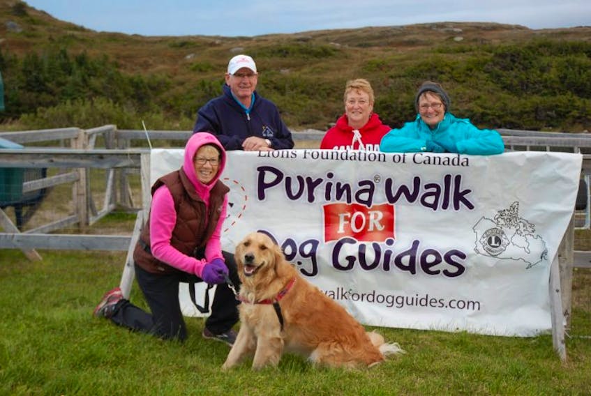 Gail Simms and her dog Brandi, along with Bruce Burton, Lorna Penney and Doreen Burton were at the dog park on Bay Street Sept. 26 for the Purina Walk for Dog Guides.