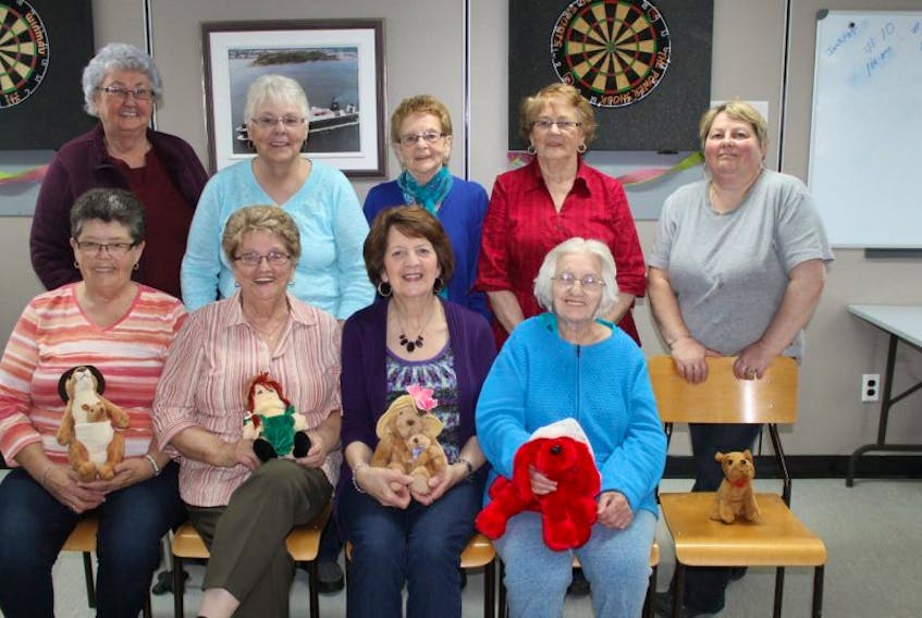 Pictured are partners Marie Dominey and Madeline Meade, Ruby Dicks and Alma Porter, Mary Pope and Kathleen Baker, Loretta Skeard and Ethel Clevette, Nancy Osmond and partner, Dale Barnes who is missing from the photo. 