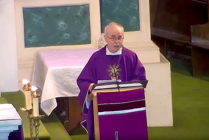 Father Cecil Critch delivers an online mass from the Basilica in St. John’s. -Screenshot