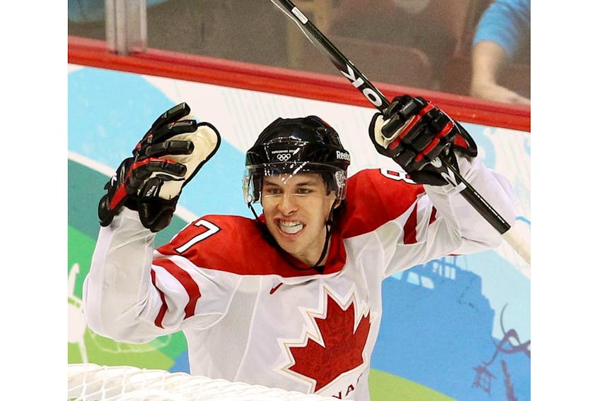 OLY--Vancouver 2010 Winter Olympics;  Canada's Sidney Crosby celebrates scoring the gold medal winning goal during the overtime period during the gold medal men's Olympic hockey game between team Canada and team USA at GM Place in Vancouver, B.C., on Sunday, Feb. 28, 2010. Photo by ANDRE FORGET/QMI AGENCY