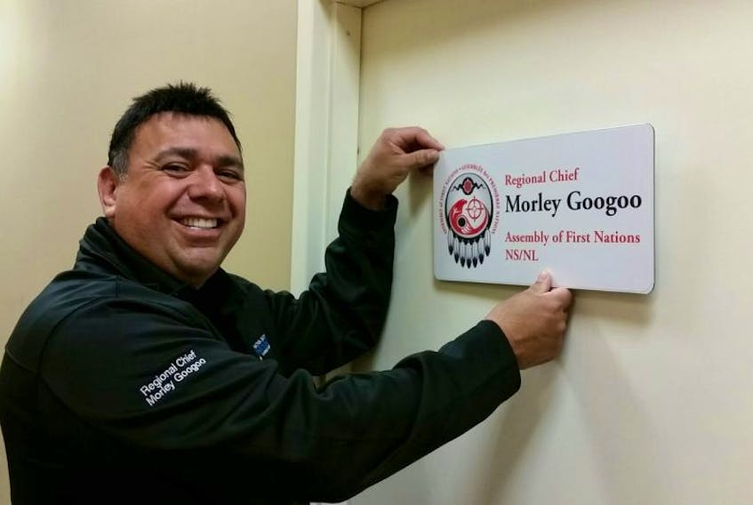 <p>Assembly of First Nations regional chief of Nova Scotia and Newfoundland and Labrador Morley Googoo attaches his nameplate to his newly opened office at the Membertou Entrepreneurship Centre on Wednesday. The office will be Googoo’s new home base following a recent move from Grand Pré in the Annapolis Valley.</p>