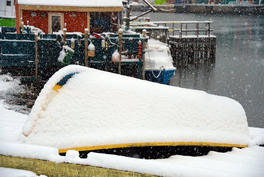A light snow falls on boats and wharves in scenic Quidi Vidi Village Friday afternoon, covering the area in a fluffy coating of the white stuff.

Keith Gosse/The Telegram