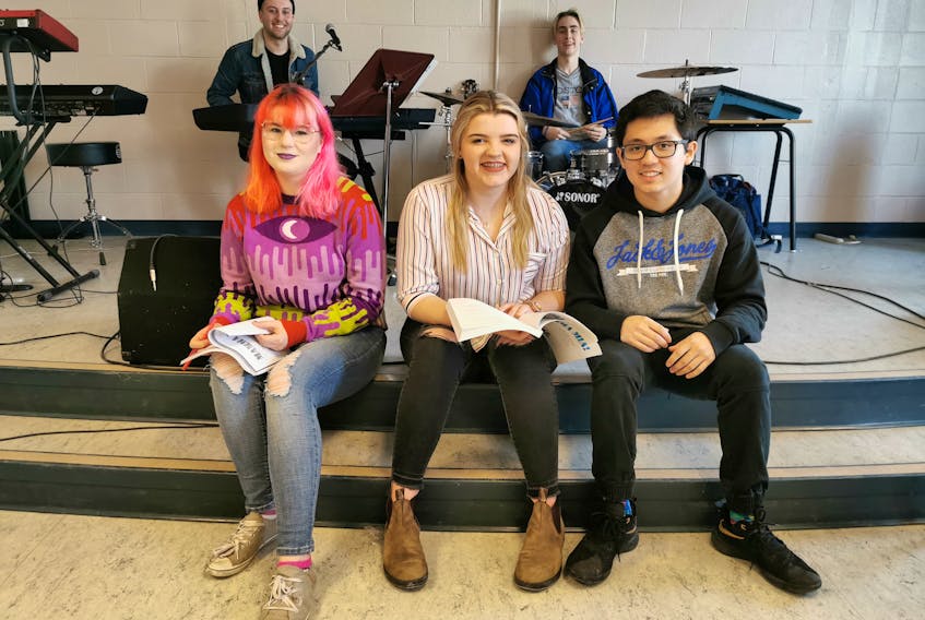 The Exploits Valley High Musical Theatre Program students, front, from left, Josie Sheppard, Shannon Ivey, and Matthew Taylor; back, from left, Aaron Collins and Nick Winsor, and approximately 75 other students, are busy preparing for the upcoming production of "Mamma Mia". It's set to take the stage at the Gordon Pinsent Centre for the Arts on May 8-10. KRYSTA CARROLL/SALTWIRE NETWORK