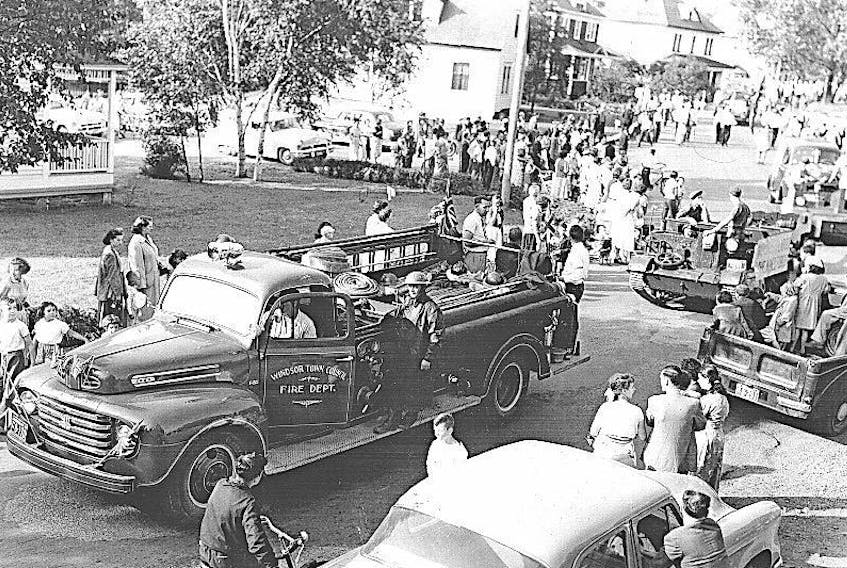 The 1951 Labour Day parade winds its way along Hill Road at the intersection with Church Road in Grand Falls. 2020 was supposed to mark the 100th edition of the community's Labour Day Parade, but the coronavirus had other plans. The parade is cancelled, but there will still be a provincial Labour Day event hosted in the town by the Newfoundland and Labrador Federation of Labour. — File photo.