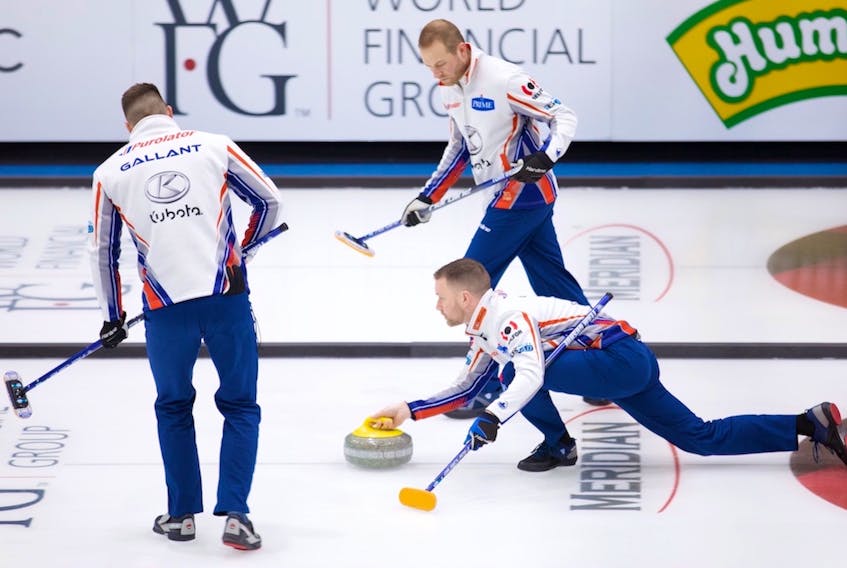 Brett Gallant and Geoff Walker (top right) get ready to sweep a shot by Brad Gushue at the Canadian Open in Yorkton, Sask. The Gushue rink, which also includes Mark Nichols, won its first four games in the Grand Slam of Curling event, but lost its fifth, getting knocked out by a 7-4 semifinal loss to John Epping. — Grand Slam of Curling/Anil Mungal