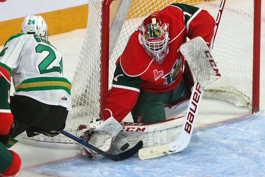 Halifax Mooseheads goalie Alexis Gravel makes a stop on Val-d'Or Foreurs forward Jacob Gaucher during an October 13, 2019 QMJHL game at the Scotiabank Centre. (TIM KROCHAK/ The Chronicle Herald)