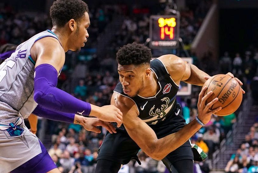 NBA commissioner Adam Silver has the task of trying to appease 30 teams with different agendas. The Bucks (Giannis Antetokounmpo pictured), Lakers, Clippers and Raptors will have similar wants given their top-four seeding. USA TODAY