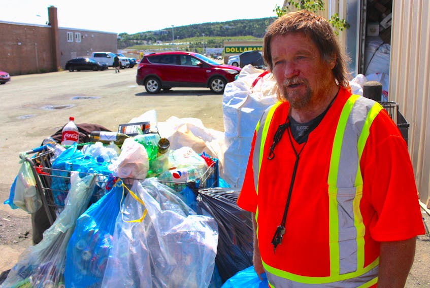 Garry Richards says he has been recycling for extra cash since he was 16 years old. At that time, he would recycle things like copper, but now the 67-year-old fills a shopping cart with bottles and cans, often from regulars who leave them out for him, before walking to O’Leary Avenue to cash them in. When the Green Depots were closed due to the COVID-19 pandemic, he took up odd jobs like mowing lawns. – Andrew Waterman/The Telegram