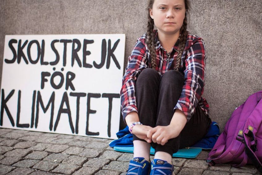 Sign of things to come: Greta Thunberg outside the Swedish parliament in 2018.