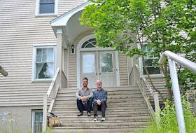 <p>Diane Crocker/The Western Star</p>
<p>Gros Morne Summer Music artistic director David Maggs, left, and Gary Graham, a member of the festival’s board of directors, pose for a photo on the steps of the former convent on Humber Road, which will be converted into Graham Academy.</p>