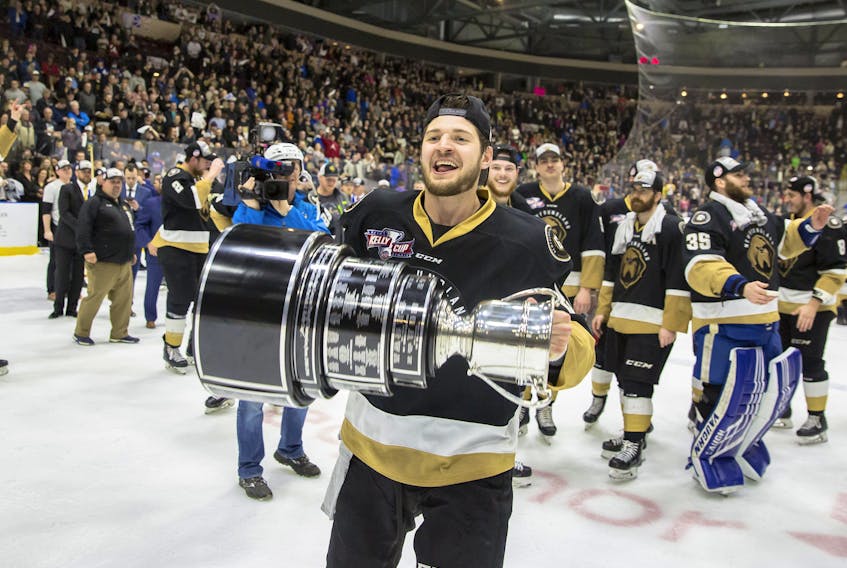 Sam Jardine hoists the Kelly Cup after the Newfoundland Growlers won the ECHL championship last year. The Growlers won't get a chance to defend their title this season. (Jeff Parsons/Newfoundland Growlers)