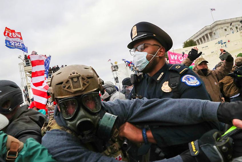 Trump supporters clash with police in front of the U.S. Capitol Building in Washington. — Reuters file photo