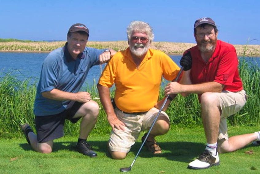 Gerry (Soupy) Campbell, centre, enjoys a day of golf at The Links at Crowbush Cove with former Guardian staffers Gary MacDougall, left, and Bill McGuire.