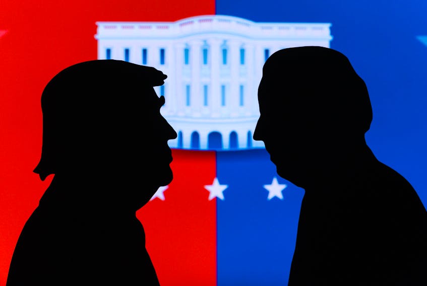 Democratic candidate for U.S. president Joe Biden, shown in silhouette, right, holds a 49 per cent to 46 per cent lead over President Donald Trump among likely Pennsylvania voters, according to a recent AARP-commissioned public opinion survey.