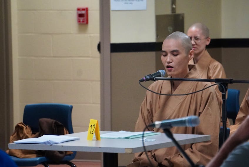 Venerable Yvonne Tsai, a Buddhist nun with the Great Wisdom Buddhist Institute, spoke during a regular council meeting in Montague on Sept. 14.