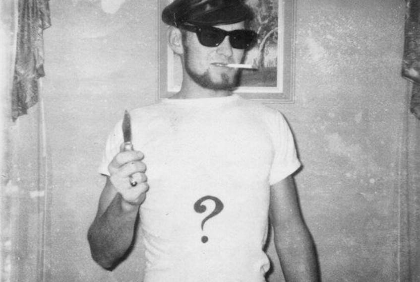 Gabriel Wortman's father, Paul Wortman, dresses as the Riddler for Halloween in this undated photo.