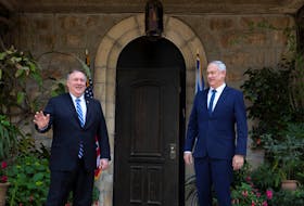 U.S. Secretary of State Mike Pompeo (left) meets with Israeli Blue and White party leader Benny Gantz in Jerusalem Thursday. Pompeo also held meetings with Israeli Prime Minister Binyamin Netanyahu. — Reuters