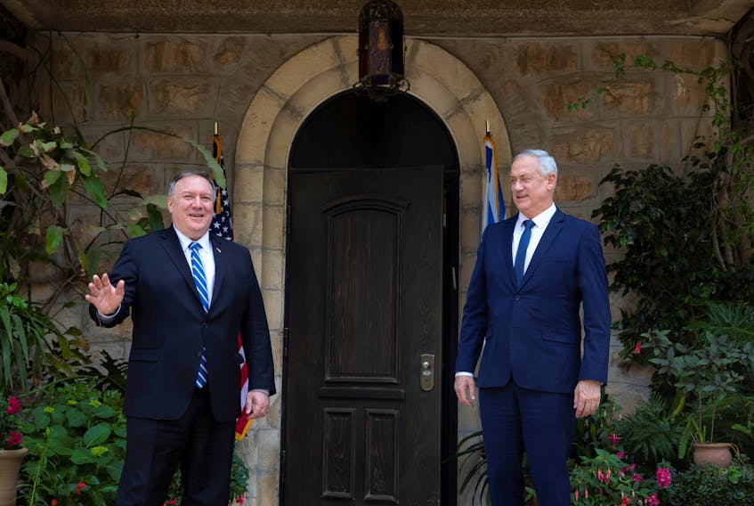 U.S. Secretary of State Mike Pompeo (left) meets with Israeli Blue and White party leader Benny Gantz in Jerusalem Thursday. Pompeo also held meetings with Israeli Prime Minister Binyamin Netanyahu. — Reuters