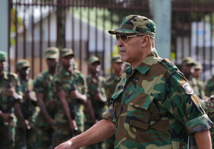 Suriname’s President Dési Bouterse reviews the troops during a ceremony at the Memre Buku military barracks, in Paramaribo, Suriname, In March 2019. This week Bouterse lost the election and may be headed to jail on a previous murder conviction. — Reuters