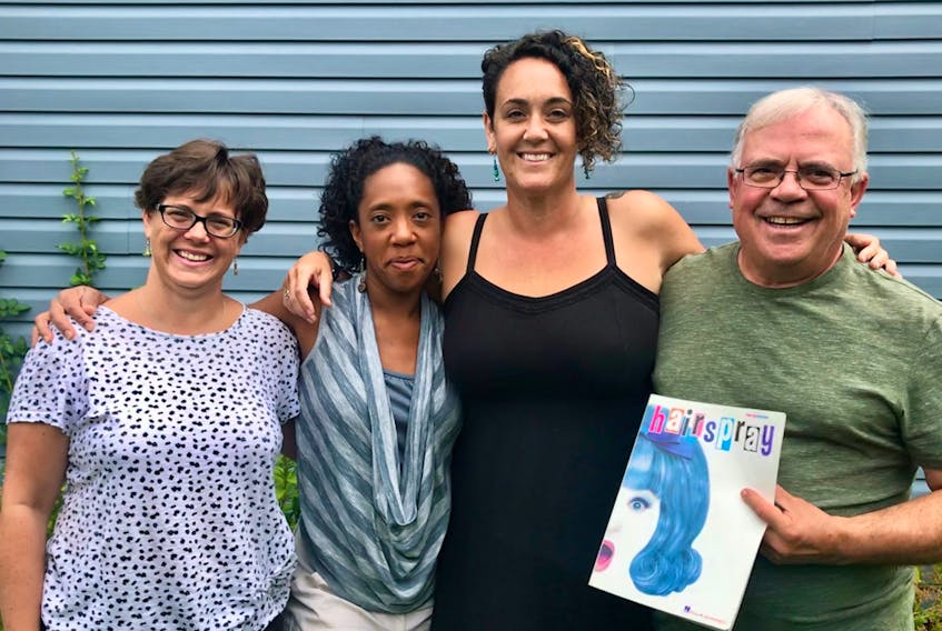 Dr. John Hugh Gillis Regional High School band program director Helen Bannerman (left), Liliona Quarmyne (choreographer), Jenn Priddle (director) and Brent Bannerman (musical director) unveil the 2018 Music of the Night production – Hairspray. Open auditions will take place Sept. 13, 14 and 16. Contributed