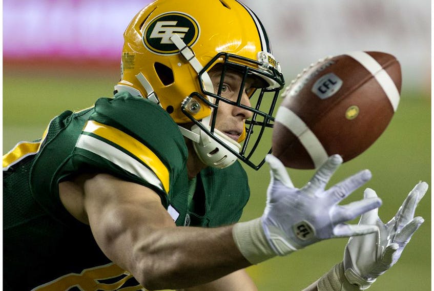 Edmonton Eskimos reciever Greg Ellingson (82) is unable to reel in a pass during fourth quarter CFL action against the Hamilton Tiger-Cats at Commonwealth Stadium in Edmonton on Friday, Sept. 20, 2019. 