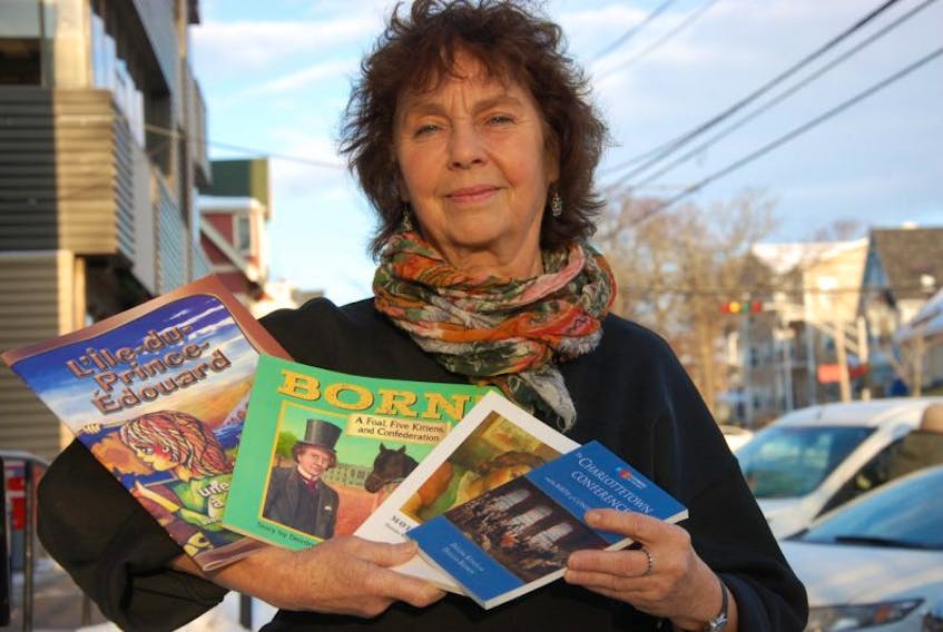 <p><span class="Normal">Deirdre Kessler holds some of her recent books. She is the co-author "The Charlottetown Conference and the Birth of Confederation" a new book by Nimbus Publishing. She wrote the book with Douglas Baldwin, a Canadian historian.</span></p>