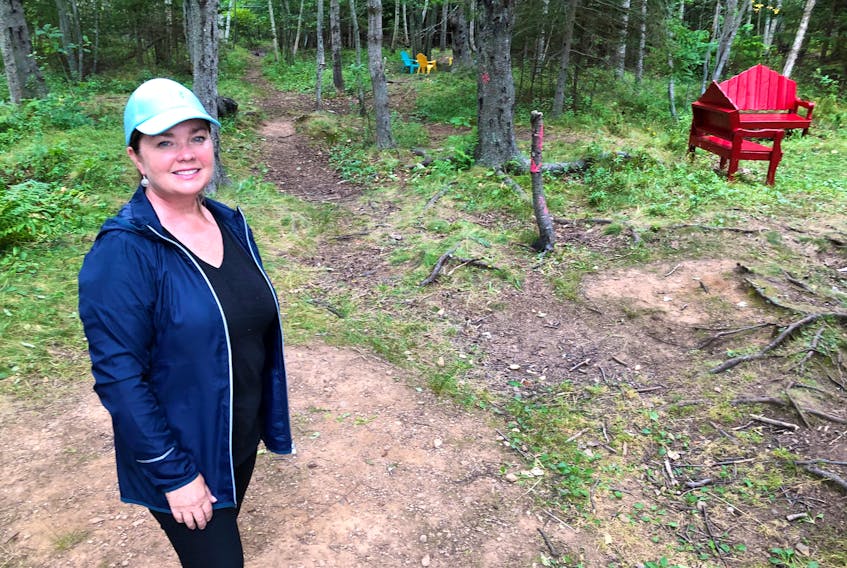 Michelle Morrison, founder of Harbourview Montessori in Westmount, stands in the woods behind the school where outdoor classrooms will be set up for students as they deal with the COVID-19 pandemic. NICOLE SULLIVAN • CAPE BRETON POST 