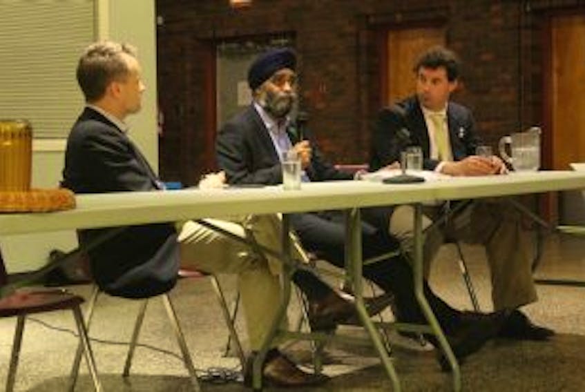 ['<p>Defence Minister Harjit Sajjan was in St. John’s Tuesday evening for a public consultation session about the future of the military along with local MPs Seamus O’Regan (left) and Nick Whalen (right).</p>']