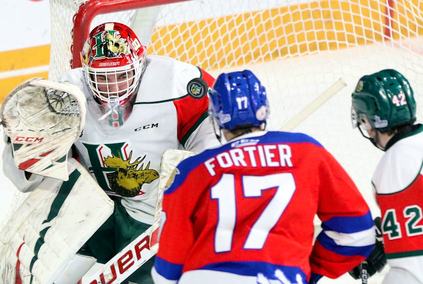 Halifax Mooseheads goalie Alexis Gravel eyes the puck during Sunday's QMJHL game against the Moncton Wildcats at the Scotiabank Centre. (ERIC WYNNE/Chronicle Herald)