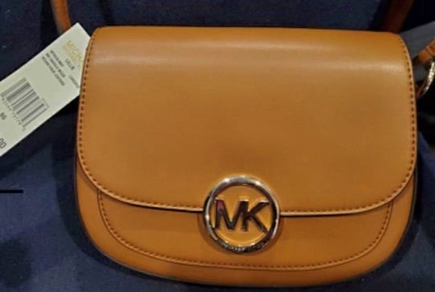This is lot #44 in the Helping Handbags online auction, donated by Exit Realty Town and Country Real Estate. CONTRIBUTED