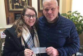 Madison Harpell of Indian Harbour Lake receives the inaugural Helping the Helpers scholarship from John Garth MacDonald. Harpell is a freshman nursing student at Dalhousie University in Halifax. Corey LeBlanc