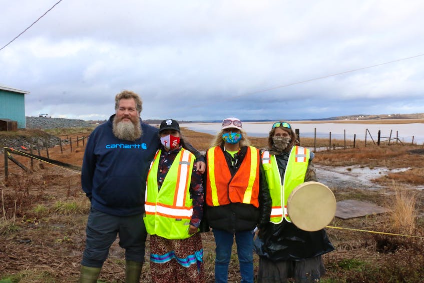 Avon River causeway protestors, from left, fisherman Darren Porter and water defenders Ducie Howe, Sandy Toney and Marian Nicholas, pictured in the fall of 2020, are advocating to see free tidal flow returned to the area, which would allow for optimal fish passage. They are not opposed to the twinning of Highway 101. — Carole Morris-Underhill/FILE