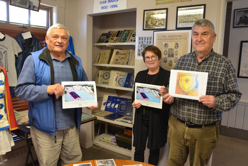 Kentville Historical Society director Mick Day, treasurer Brian Pulsifer and secretary and publicity chairperson Lynn Pulsifer with copies of the “KCA Through the Years” historic calendar. KIRK STARRATT