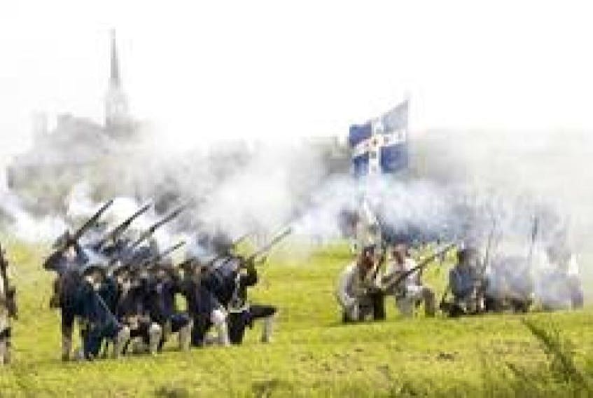 French soldiers fire muskets at approaching British troops during a past re-enactment at the Fortress of Louisbourg. 