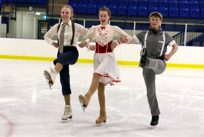 Riverview Skating Club skaters Chloe Harvie (Uncle Albert), Nicole Leary (Mary Poppins), and Bishop Lake (Bert) horse around as they prepare to go over their routines for an upcoming show.