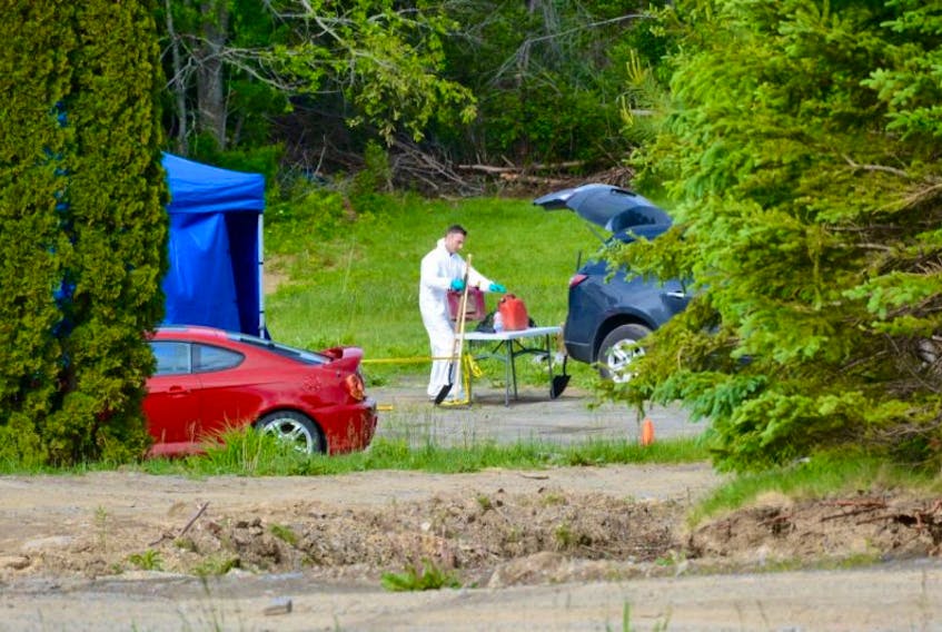 Members of Northeast Nova Major Crimes, an investigative unit of the RCMP, continue to investigate the scene of a homicide in South Rawdon on June 15, 2017. The initial fire occurred on April 3.