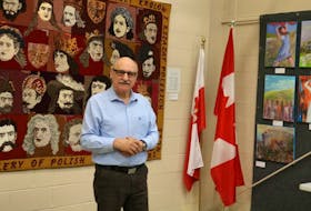 Wieslaw Machel spent May 20 acting as a tour guide for the Polish art show in Windsor. One of the large, eye-catching pieces on display was by Amherst’s Dr. Halina Bieńkowska. She submitted two rug wall hangings that depicted a gallery of polish princes and kings.