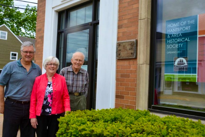 Judson Porter (left), Marg Johnston and Roy Bishop, all volunteers who helped make the new Hantsport Heritage Society’s new home a reality stand outside the new building.