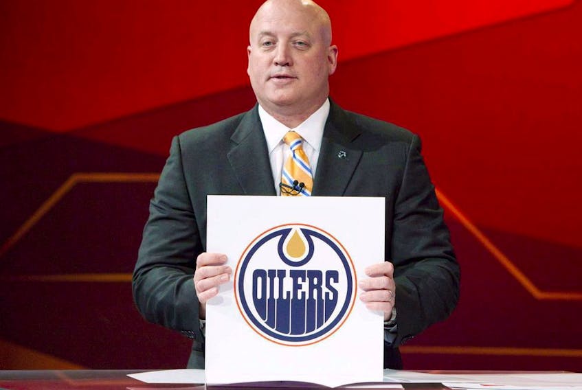 Deputy Commissioner of the NHL Bill Daly announces the top pick in the 2011 NHL Entry Draft to the Edmonton Oilers during the NHL Draft Lottery in Toronto Tuesday, April 12, 2011. 