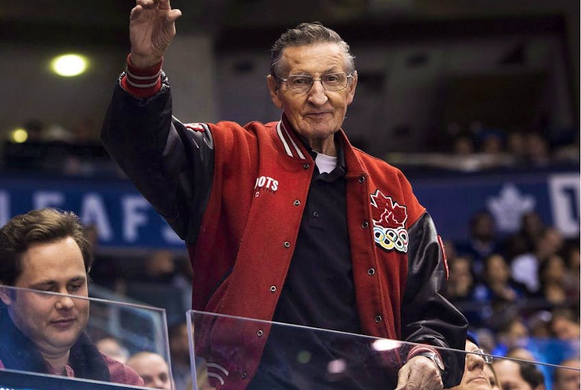 CP-Web.  Walter Gretzky, father of Hockey Hall-of-Famer Wayne Gretzky, waves to fans as the Buffalo Sabres play against the Toronto Maple Leafs during third period NHL hockey action in Toronto on Tuesday, January 17, 2017.&nbsp;Police say they have made two arrests after Wayne Gretzky memorabilia was stolen from the home of the hockey legend's father. The Gretzky family reported the souvenirs were stolen from Brantford, Ont., home of Walter Gretzky in August.