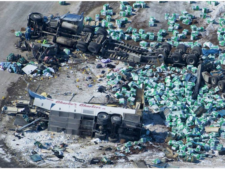 Aerial photo on April 7, 2018, shows wreckage after a bus carrying the Humboldt Broncos hockey team and a tractor-trailer collided outside of Tisdale, Sask.