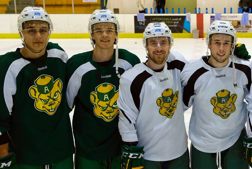 University of Alberta Golden Bears Clayton Kirichenko, left, Steven Owre, Trevor Cox and Cole Sanford were hoping to get another chance to play against Team Canada's world junior squad Nov. 28 and 29. The games were cancelled due to positive COVID-19 cases in the selection camp in Red Deer.